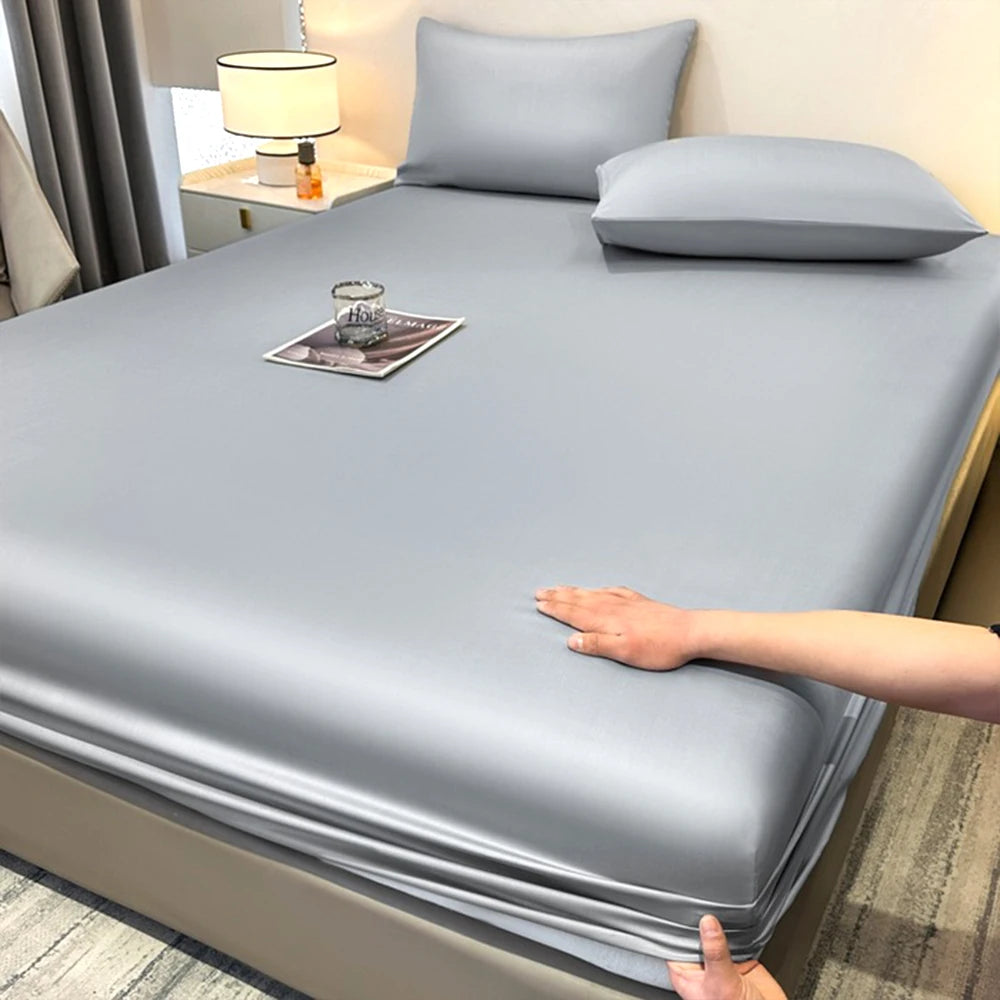 parure lit drap housse élastique soie glacée oreillers coton frais bleu clair uni