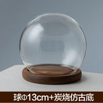 boule verre transparent socle bois décoration d'intérieur moderne objet d'exposition moderne