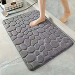 tapis bain gris rose bleu marine mousse mémoire forme texture galets moderne adhésif 40x60