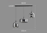 luminaire suspension moderne verre transparent doré câble salon salle manger
