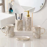 ensemble vaisselle salle bain marbre blanc gris or classique tasses poignées dorées porte brosse