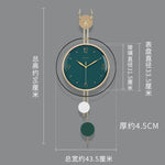 horloge murale moderne or boisée tête cerf suspension décorative vert blanc chambre verte
