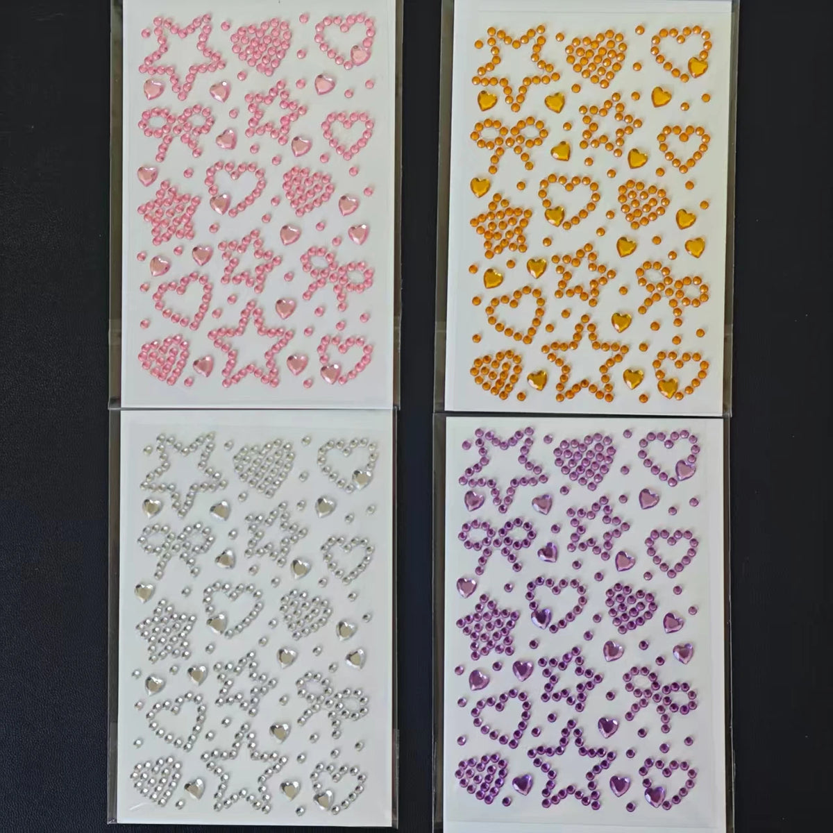 feuilles autocollantes motifs cœurs étoiles rubans abstrait rose jaune bleu violet rouge enfants