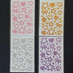 feuilles autocollantes motifs cœurs étoiles rubans abstrait rose jaune bleu violet rouge enfants
