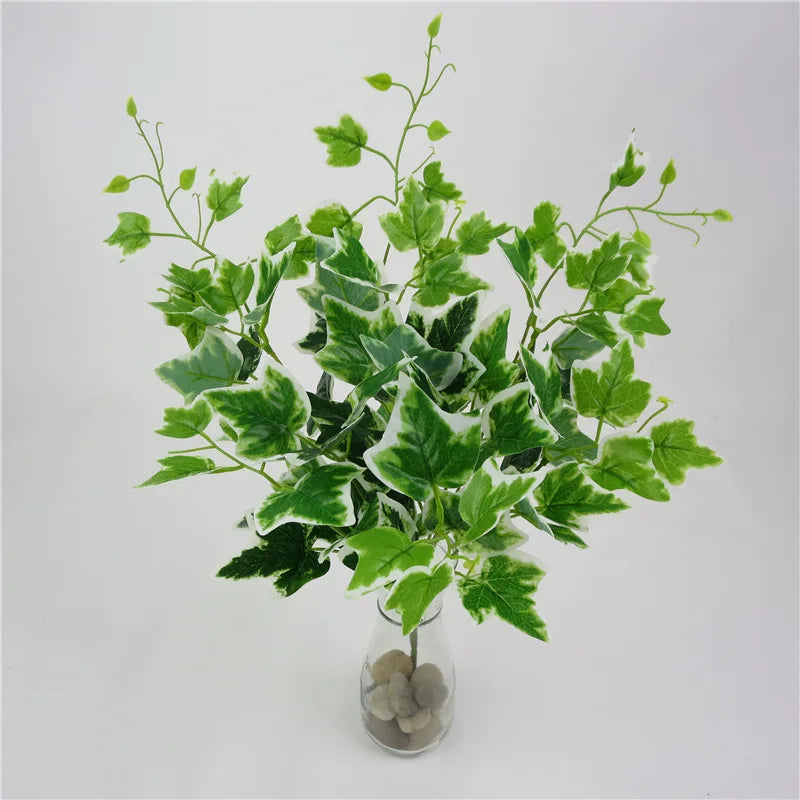 plantes artificielles violet vert marron feuilles ovales moderne décoration extérieure vase galets noirs blancs