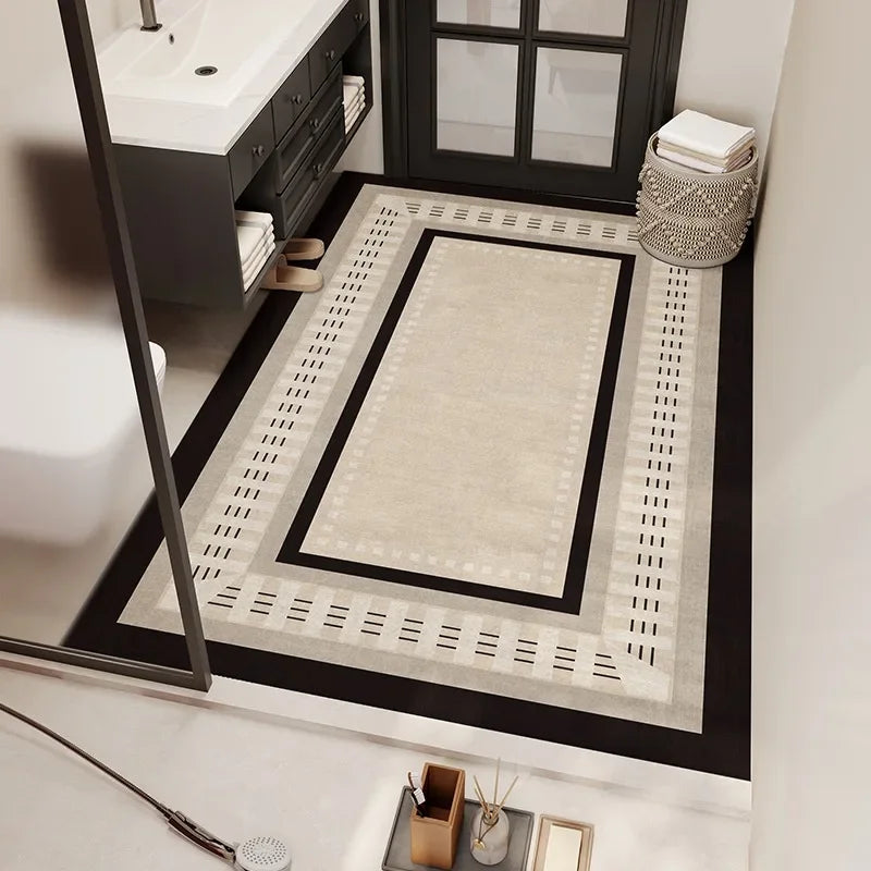 Le sol de la salle de bain présente un carrelage géométrique noir et blanc, créant un design élégant et moderne.