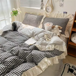 Détail du tissu coton jacquard de la housse de couette noire