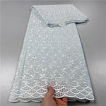 tissu dentelle coton blanc motifs floraux broderie strass robe couture luxe