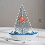 décoration maison bateau voile miniature blanc bleu clair coquillage étoile mer oiseau filet pêche