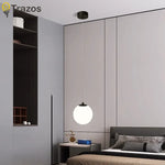 suspension lumineuse moderne minimaliste noir deux globes blancs métal chambre salon