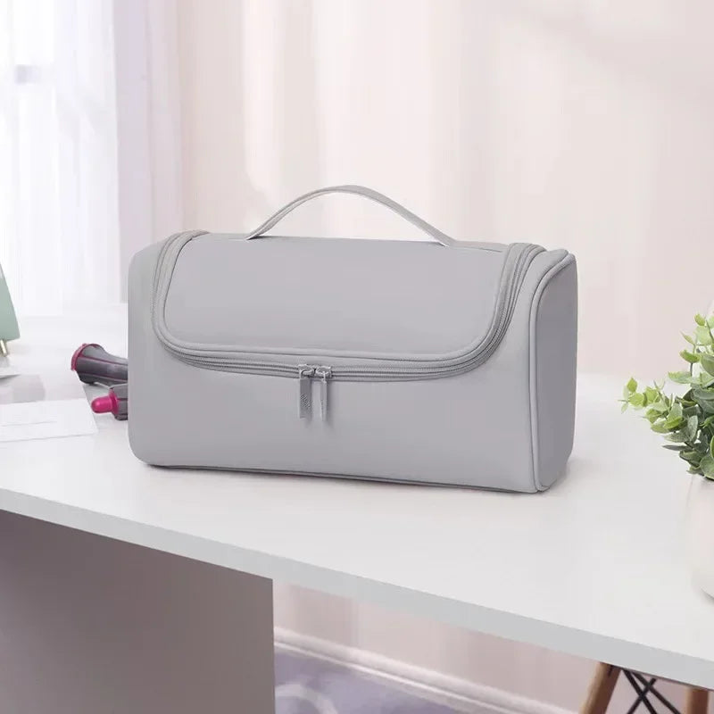 Sac rangement coiffure noir rose gris moderne pratique poignée amovible diffuseur concentrator peigne brosse