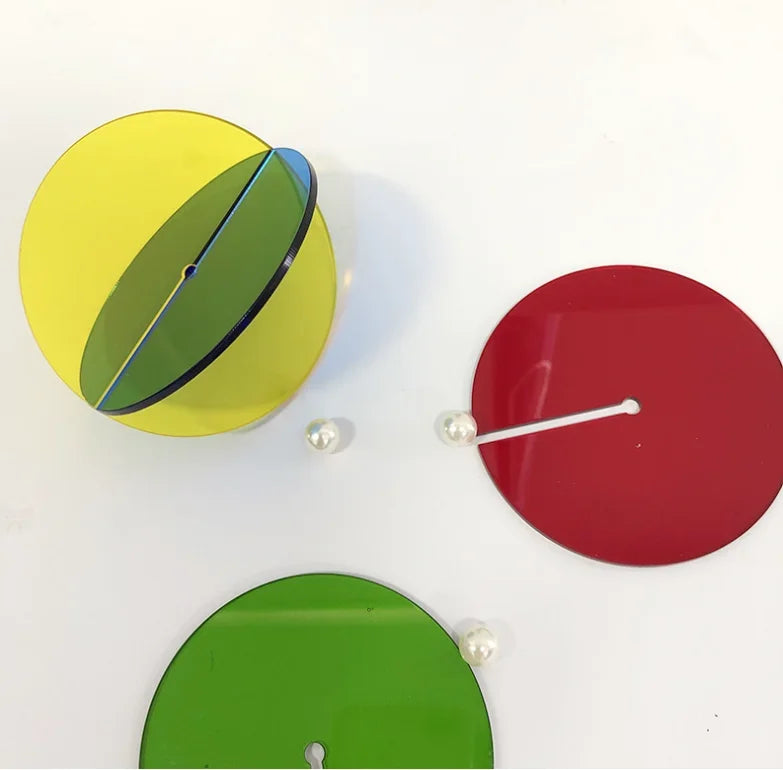 support verre moderne acrylique tapis rond texturé boule verre bleu vert orange jaune rouge