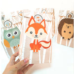 Sacs cadeaux pliables avec lion girafe singe