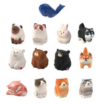 statue animale bois figurine bleu rose motif floral minimaliste yeux stylisés petite deco