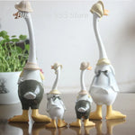 statues canards blanc beige vert sculpture animaux détails décorative jardin rustique textures résine