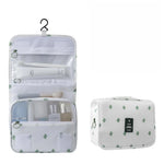 Sac maquillage pliable moderne bleu marine crochets poches intérieures pratique