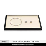 plateau présentation bijoux cuir velours strass classique bracelet boucles oreilles bagues colliers portable festival