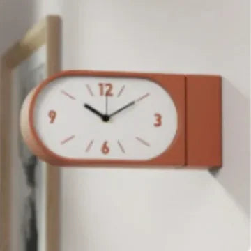 horloge murale moderne minimaliste vert orange noir cadran aiguilles simple salon decoration