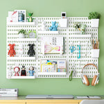 panneau rangement perforé blanc moderne fixation murale porte clés cache câbles support plante horloge