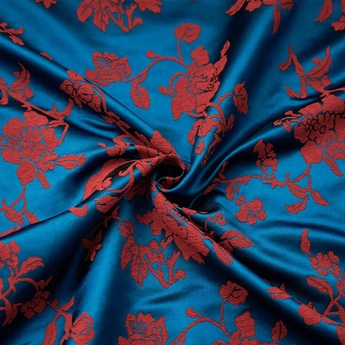 tissu brodé fleurs rouge bleu polyester largeur 144cm opacité respectueux environnement jacquard decoration couture