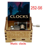 boîte musicale bois naturel motifs floraux 18 tons vintage manivelle horlogerie artisanale