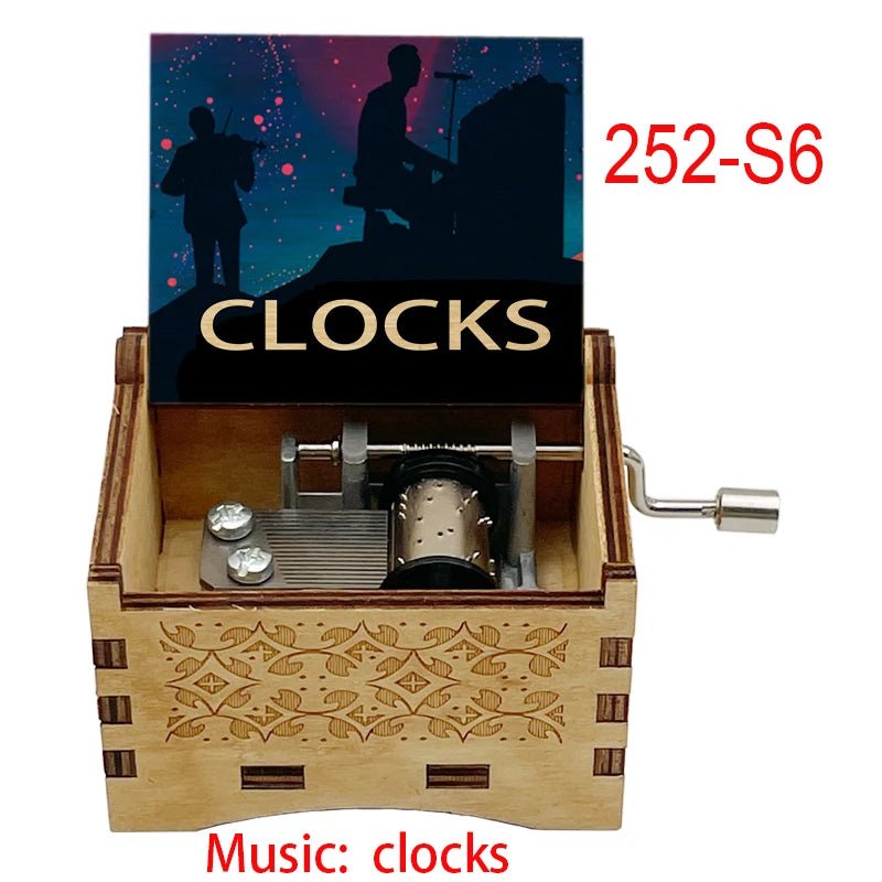 boîte musicale bois naturel motifs floraux 18 tons vintage manivelle horlogerie artisanale