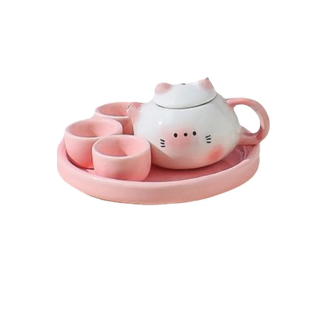théière forme chat blanc orange rose visage mignon oreilles pointues taches oranges decorative cartoonish