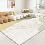 Un tapis moderne aux motifs ondulés créant une atmosphère apaisante et harmonieuse dans ce salon contemporain.