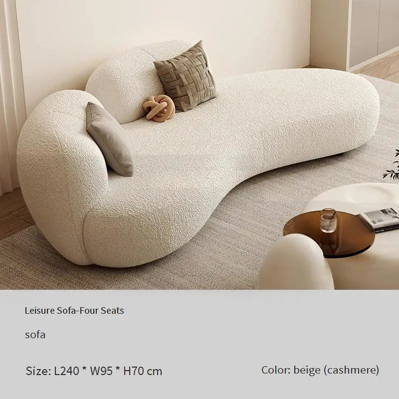 canapé lit blanc bouclé moderne table basse coussins décoratifs