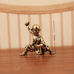 statuettes miniatures moines dorées poses artisanales décorations maison