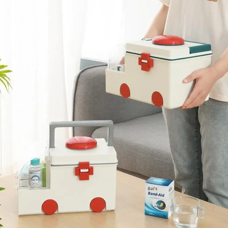 boîte rangement médicaments blanc rouge moderne pratique poignée amovible emballages médicaux flacons boîtes