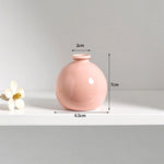 vases décoratifs modernes couleurs blanc rose vert bleu violet rond lissesintérieur maison