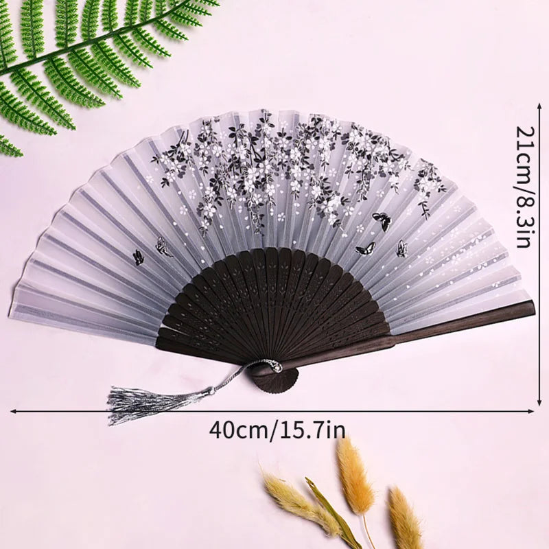 éventail pliant traditionnel bambou motif fleurs cerisier pompon mariage élégant