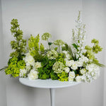 décoration florale arche vert roses hortensias delphiniums mariage romantique extérieur événement festive