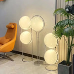 lampe sol moderne sphères blanc jaune translucides décoration intérieure chambre salon