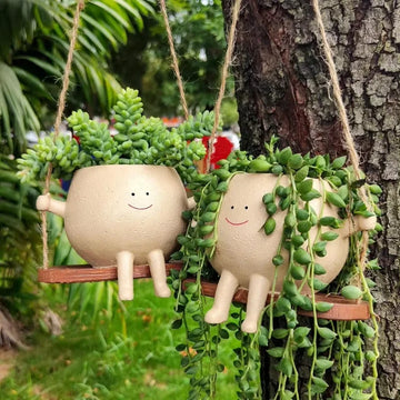 pots fleurs suspendus resine forme personnages souriants balançoire crème marron