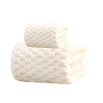 serviette bain moderne rose clair absorbante texture cotonnée motif géométrique douce séchage rapide