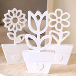 porte carte silicone forme fleur moderne blanc adhésif minimaliste motifs floraux légèrement rugueux