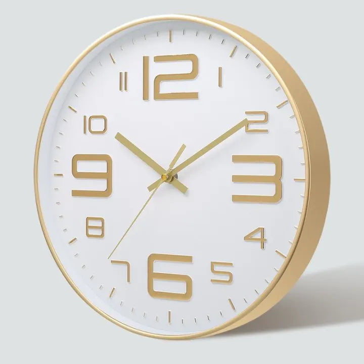 horloge murale moderne chiffres relief aiguilles fines blanc rose doré noir minimaliste