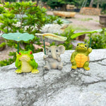 figurines animaux jardin vert beige gris cartoon éléphant grenouille tortue tringle feuilles libellules