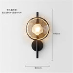 lumière murale moderne verre texturé noir doré contemporaine deux ampoules LED
