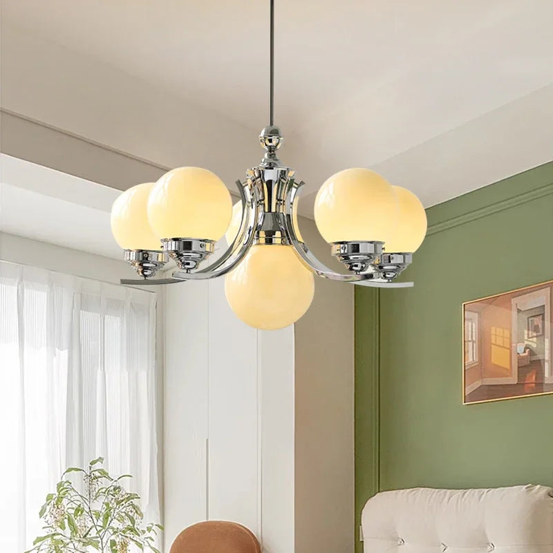 lustre moderne chrome sphères translucides suspension câble led têtes têtes orange