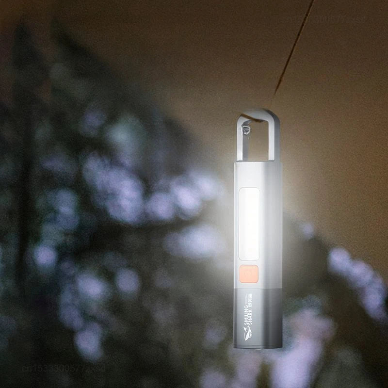 lampe torche rechargeable lumiere intense gris orange moderne anneau fixation interrupteur led