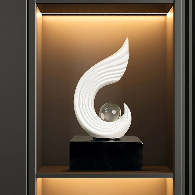 statuettes décoratives modernes or blanc noir spirale sphère transparente minimaliste sculptural