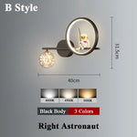 applique murale moderne astronaute étoile dorée noir blanc led chambre enfants