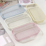 paniers rangement blanc bleu rose jaune maille fine moderne minimaliste sans fixation papeterie