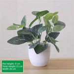 décoration extérieure plante artificielle verte feuilles simples moderne pot blanc accrochable branchu exposition anniversaire