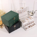 boîte rangement bijoux cuir motifs géométriques compartiments velours classique vert noir blanc rose chic