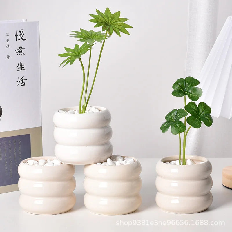 Pot plante moderne céramique beige rayures horizontales plante verte intérieure décoration maison