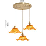 suspension lumineuse vintage transparente motifs floraux vert orange bleu